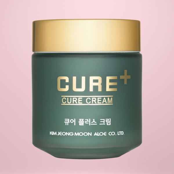 Cure Cream jar with gold lid on a pink background