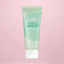 Tube of Cure Hydro-Green Aloe Foam Cleanser on a pink background